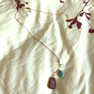 Gold necklace with stone pendant
